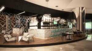 Un moderno bar deportivo ubicado en uno de los mejores resorts de México, con una barra de mármol, taburetes verdes, sillones y múltiples pantallas de televisión; perfecto para eventos de conferencias o después de reuniones, con una decoración elegante e iluminación contemporánea.
